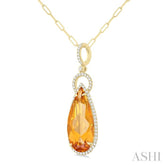 22X10 MM Pear Cut Citrine and 1/3 Ctw Round Cut Diamond Halo Semi-Precious Pendant With Chain in 14K Yellow Gold